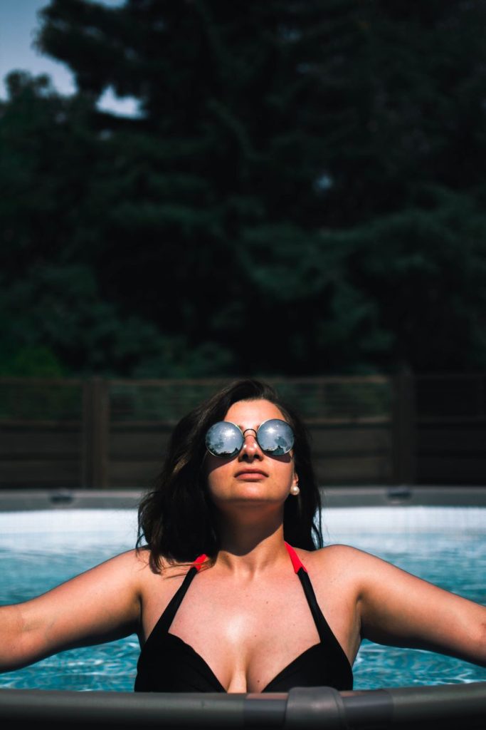 Woman in a bikini by the water
